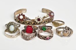 A SELECTION OF JEWELLERY, to include eleven rings such as two silver opal and garnet cluster ring,