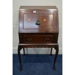 A MODERN MAHOGANY BUREAU, with a single drawer, on cabriole legs, width 54cm x depth 40cm x height