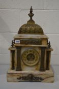 AN EARLY 20TH CENTURY MARBLE AND BRASS FRENCH MANTEL CLOCK, with a Roman figure finial, the brass