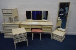 A MODERN CREAM BEDROOM SUITE, comprising a dressing table with a triple mirror, stool, chest of four