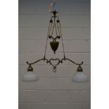 A MID 20TH CENTURY FOLIATE BRASS RISE AND FALL TWIN BRANCH CEILING LIGHT