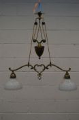 A MID 20TH CENTURY FOLIATE BRASS RISE AND FALL TWIN BRANCH CEILING LIGHT