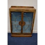 A 1930'S WALNUT TWO DOOR CHINA CABINET, with later painted chinoiserie decoration, approximate width