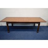 A REPRODUCTION MAHOGANY AND BANDED RECTANGULAR EXTENDING DINING TABLE, on square reeded legs, with