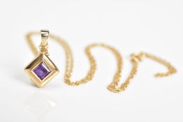 A 9CT GOLD AMETHYST PENDANT NECKLACE, the square cut amethyst set within a plain polished square