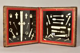 PRISONER OF WAR BONE CARVINGS, a collection of 19th Century carvings housed in a hinged book