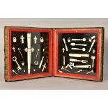 PRISONER OF WAR BONE CARVINGS, a collection of 19th Century carvings housed in a hinged book