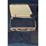A SUITCASE FULL OF WOMENS AIR FORCE BLUE WOOLLEN SKIRTS, all appear good condition and post WWII