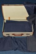 A SUITCASE FULL OF WOMENS AIR FORCE BLUE WOOLLEN SKIRTS, all appear good condition and post WWII