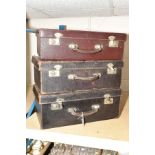 THREE VINTAGE LEATHER COVERED MEDICAL CASES WITH DRAWERS FITTED TO THE INTERIORS, the lid