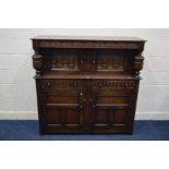 A REPRODUCTION CARVED OAK COURT CUPBOARDS the top section with double panelled doors flanked with
