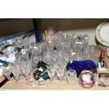 A QUANTITY OF DRINKING GLASSES AND COLOURED GLASSWARE, including cylindrical decanter with silver