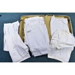 A RIGID SUITCASE FULL OF MILITARY WHITES, mainly trousers, Naval etc
