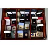 A WOODEN DISPLAY BOX AND CONTENTS OF JEWELLERY, the dark wooden display box with glass front, length