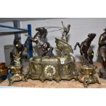 A VICTORIAN STYLE BRASS AND BRONZED CLOCK GARNITURE, the clock with female figure in a chariot,