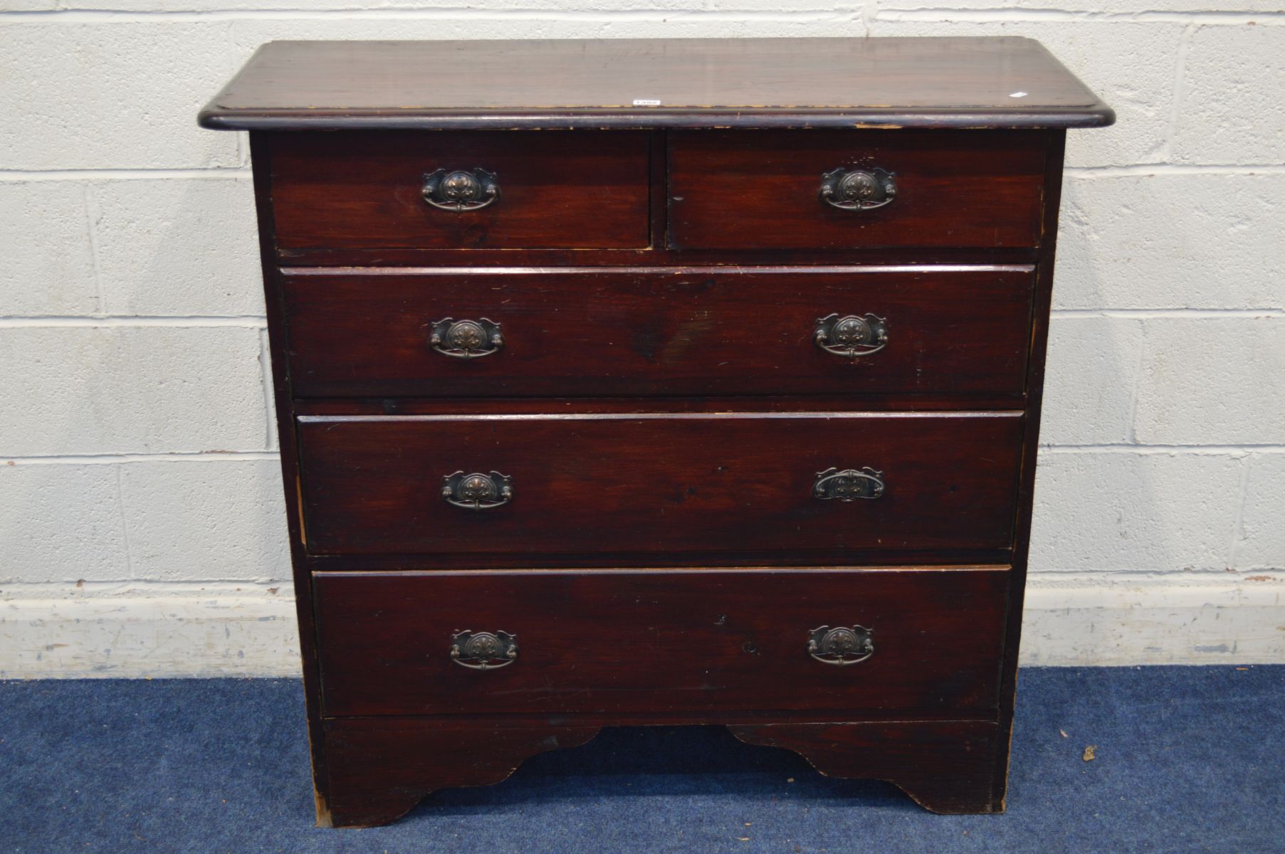 AN EDWARDIAN STAINED PINE CHEST OF TWO OVER THREE LONG DRAWERS, width 110cm x depth 43cm x height