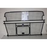 A LAND ROVER VUB502080 DOG GUARD for a Range Rover Sport with fitting instructions
