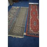 A LATE 20TH CENTURY TURKISH BUHARA GREEN GROUND CARPET RUNNER, 99cm x 68cm and similar green