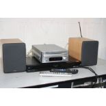 A DENON RCD-M35DB CD PLAYER with matching speakers together with a Panasonic DMR-EX773 DVD