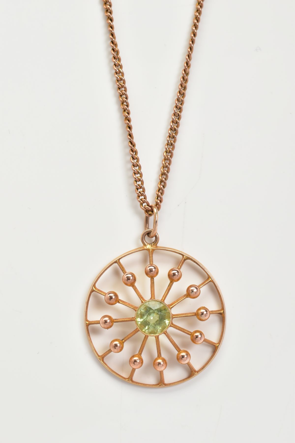 AN OPENWORK PENDANT NECKLACE, the circular openwork panel pendant set with a central circular cut - Image 2 of 4