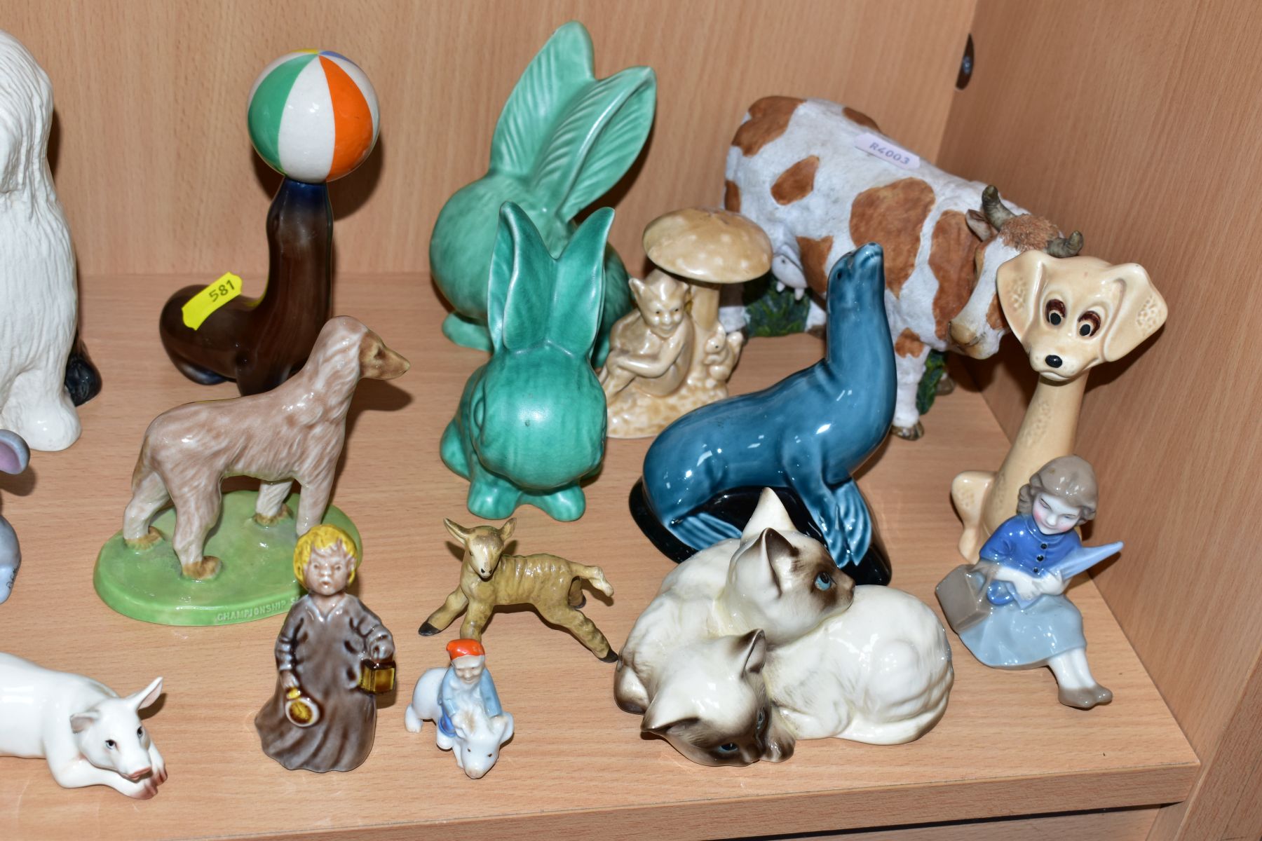 A GROUP OF VARIOUS ANIMALS AND ORNAMENTS, to include Beswick Comical Dashund No1088, two Black Faced - Image 2 of 10