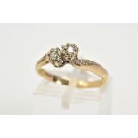 A 9CT GOLD DIAMOND SET RING, of asymmetrical design set with two illusion set round brilliant cut
