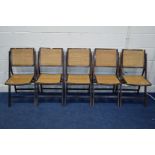 A SET OF FIVE FOLDING CHAIRS with a bergere back and seat