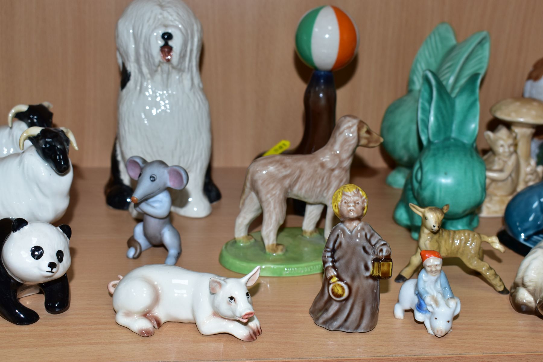 A GROUP OF VARIOUS ANIMALS AND ORNAMENTS, to include Beswick Comical Dashund No1088, two Black Faced - Image 9 of 10
