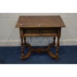 AN 18TH CENTURY AND LATER OAK LOWBOY, with an overhanging top, single drawer brass drop handle, on