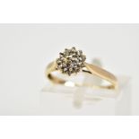 A 9CT GOLD DIAMOND CLUSTER RING, the tiered cluster set with single cut diamonds, tapered