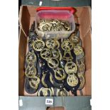 A BOX OF REPLICA HORSE BRASSES, loose and on straps, including Elizabeth II Silver Jubilee, ship,