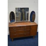 A 1950/60'S TEAK DRESSING CHEST, with triple mirrors, four graduating drawers flanked by a single