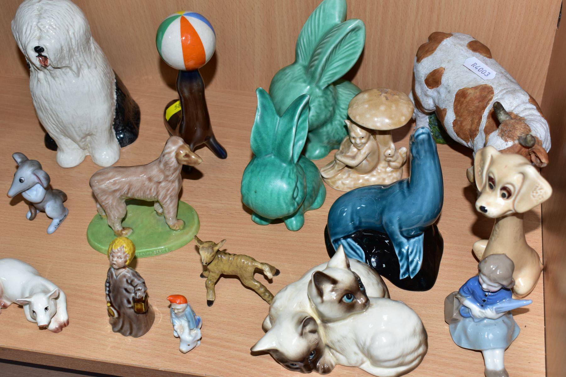 A GROUP OF VARIOUS ANIMALS AND ORNAMENTS, to include Beswick Comical Dashund No1088, two Black Faced - Image 7 of 10