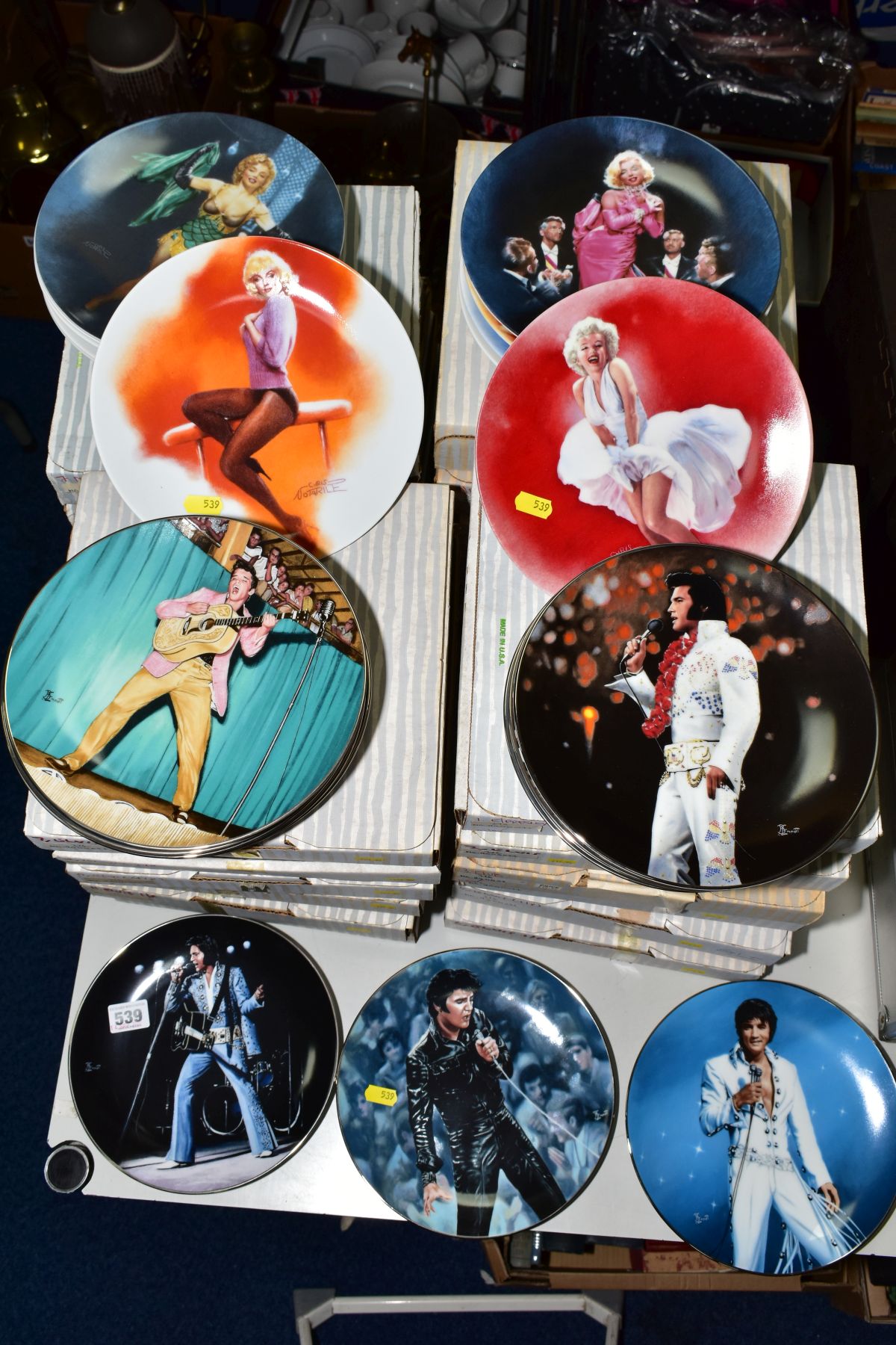 TWELVE BOXED COLLECTORS PLATES DECORATED WITH ELVIS PRESLEY, together with another twelve boxed