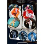 TWELVE BOXED COLLECTORS PLATES DECORATED WITH ELVIS PRESLEY, together with another twelve boxed