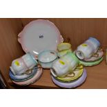 A ROYAL ALBERT 'RAINBOW' PATTERN TWENTY ONE PIECE TEA SET, comprising six cups, saucers and tea