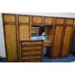 A REPRODUCTION MAHOGANY THREE SECTION BEDROOM FITMENT, overall width 276cm x depth 53cm x height