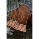 A FOLDING TEAK OCTAGONAL GARDEN TABLE, diameter 90cm with two matching folding chairs (3)