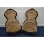 A PAIR OF VICTORIAN ROSEWOOD FOLIATE SCROLLED SPOONBACK CHAIRS, on cabriole front legs, width of