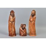 THREE STAINED IVORY EFFECT RESIN FIGURES OF CHINESE ELDERS, two standing and one crouching,