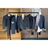 SIX ITEMS OF RAF UNIFORM CLOTHING to include five dress jackets and one possibly post WWII short