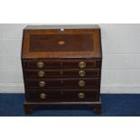 A GEORGIAN MAHOGANY, CROSSBANDED AND STRUNG BUREAU, with a shell inlay to the door, enclosing a
