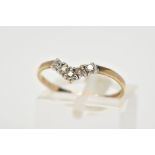 A 9CT GOLD RING, of V shape design set with five circular cut cubic zirconia to a plain polished