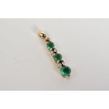 A MODERN EMERALD AND DIAMOND DROP PENDANT, measuring approximately 22mm in length, stamped '9k',