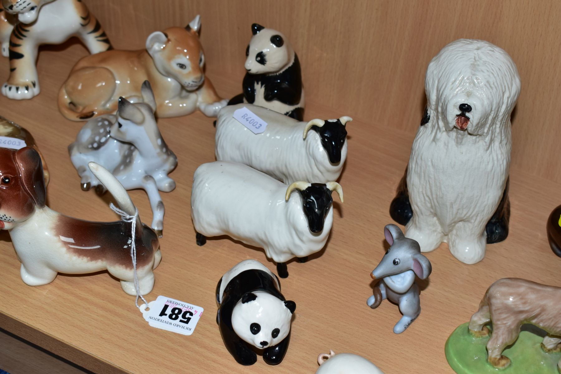 A GROUP OF VARIOUS ANIMALS AND ORNAMENTS, to include Beswick Comical Dashund No1088, two Black Faced - Image 6 of 10
