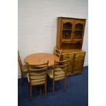 A MODERN PINE CIRCULAR PEDESTAL KITCHEN TABLE, diameter 90cm x height 77cm, four beech ladder back