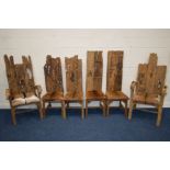 A SET OF SIX RUSTIC HARDWOOD DINING CHAIRS, incorporating various period wooden planks, with