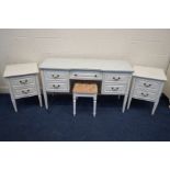 A MODERN OLYMPUS FURNITURE WHITE DRESSING TABLE with five drawers, width 136cm x depth 47cm x height