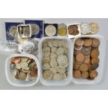 A BISCUIT TIN OF COINS, to include some silver 3d coins and a restrike Thaler, etc