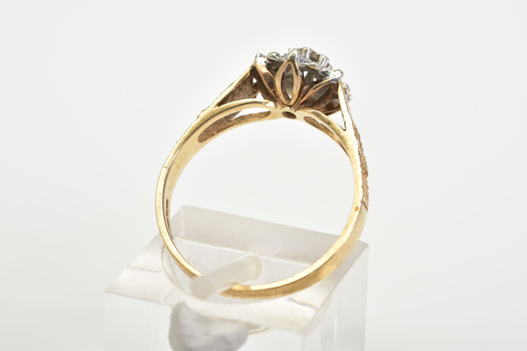 A 9CT GOLD DIAMOND CLUSTER RING, the tiered cluster designed with illusion set single cut diamonds, - Image 3 of 3